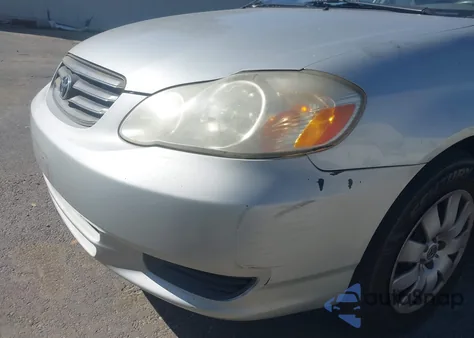 2004 Toyota Corolla Le z USA, uszkodzony, nr VIN 1NXBR32E24Z300903